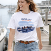 Woman wearing the white Rowing Club coastal T-shirt at a marina.