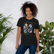 Front view of the Calm & Serene botanical T-shirt in black heather.