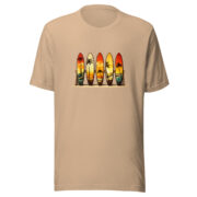 Front view of the Retro Surf Rack T-shirt in tan, featuring colorful surfboards and palm trees.
