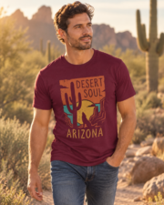 Man wearing the Arizona Desert Soul t-shirt in maroon on a desert trail