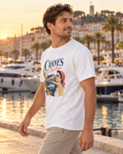 Man walking by Cannes marina in the white Cannes Côte d’Azur Comfort Colors 1717 tee