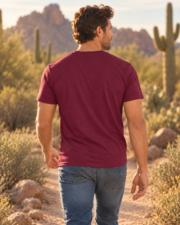 Back view of a man wearing the Arizona Desert Soul t-shirt in maroon on a desert trail