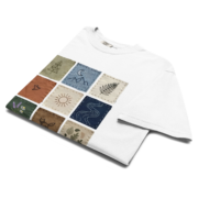 Folded white Comfort Colors T-shirt with a nine-panel botanical patchwork graphic