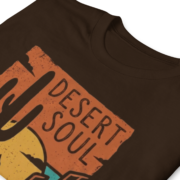 Close-up of the Arizona Desert Soul graphic on a dark chocolate t-shirt