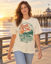 Woman walking near the Santa Cruz pier in an ivory vintage surf T-shirt