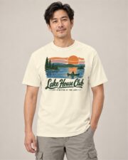 Man wearing the Ivory Lake House Club Sunset T-shirt, front view, studio
