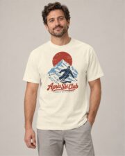 Man wearing the Ivory Après Ski Club Skier T-shirt, front view, studio