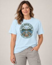 Woman wearing the Chambray Lake House Club Crest T-shirt, front view, studio