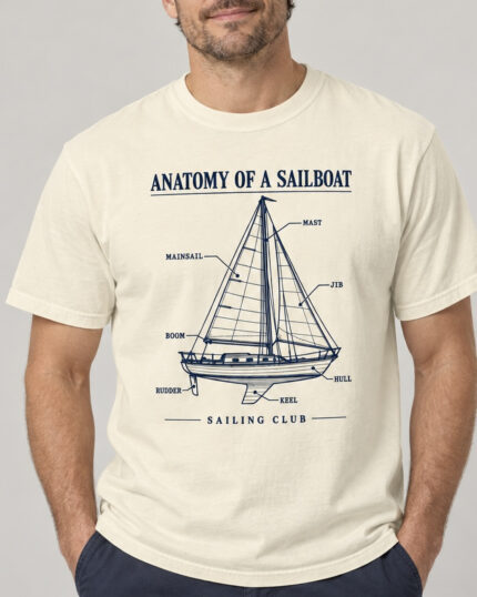 Man wearing the Ivory Anatomy of a Sailboat T-shirt, front view, studio