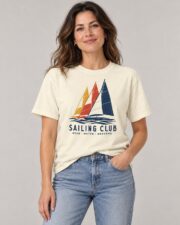 Woman wearing the Ivory Sailing Club Regatta T-shirt, front view, studio