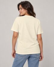 Back view of the Ivory Anatomy of a Sailboat T-shirt on a woman, studio