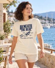 Woman in the Ivory Beneath the Blue scuba diver T-shirt on a coastal terrace