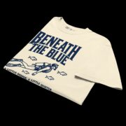 Ivory Beneath the Blue Scuba Diver T-shirt laid flat