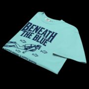 Lagoon Blue Beneath the Blue Scuba Diver T-shirt laid flat