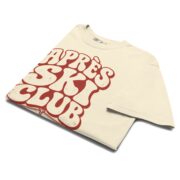 Folded Ivory Après Ski Club Retro T-shirt showing the retro lettering