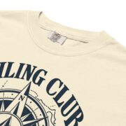 Close-up of the compass rose print on the Ivory Sailing Club T-shirt
